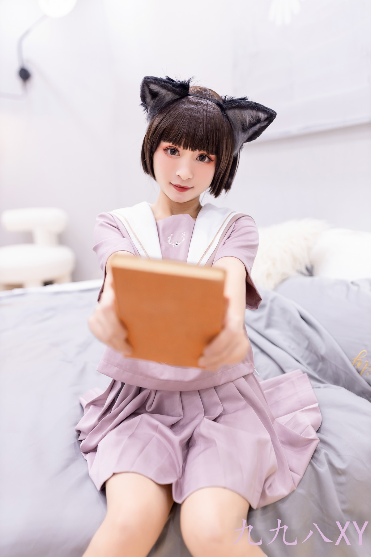 Xgyw.Net_动漫博主九九八XY大灰狼主题私房性感学生制服半撩短裙露翘臀美腿诱惑写真53P