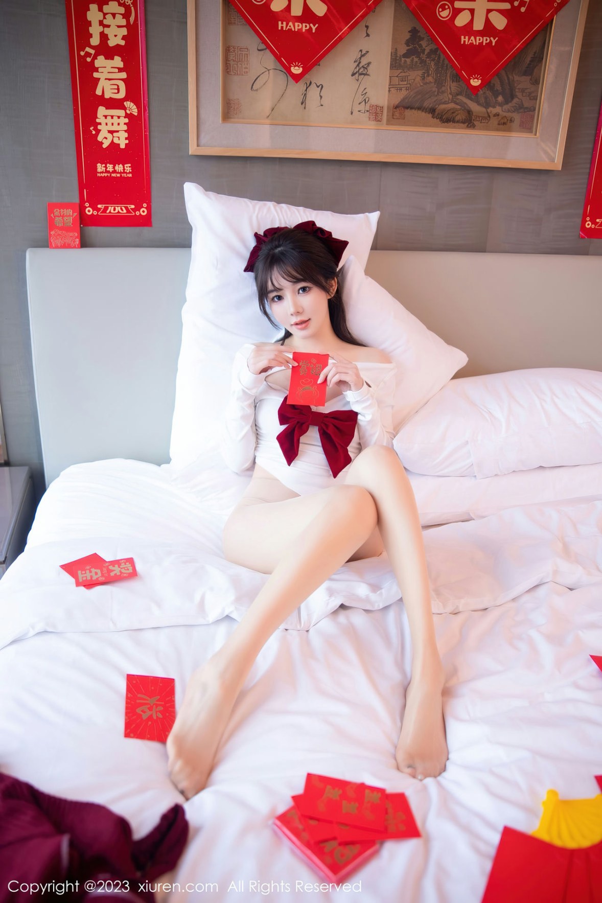 Xgyw.Net_XiuRen第6168期_模特婠婠么新春主题私房床上脱低胸服饰秀绝美身材迷人诱惑写真84P